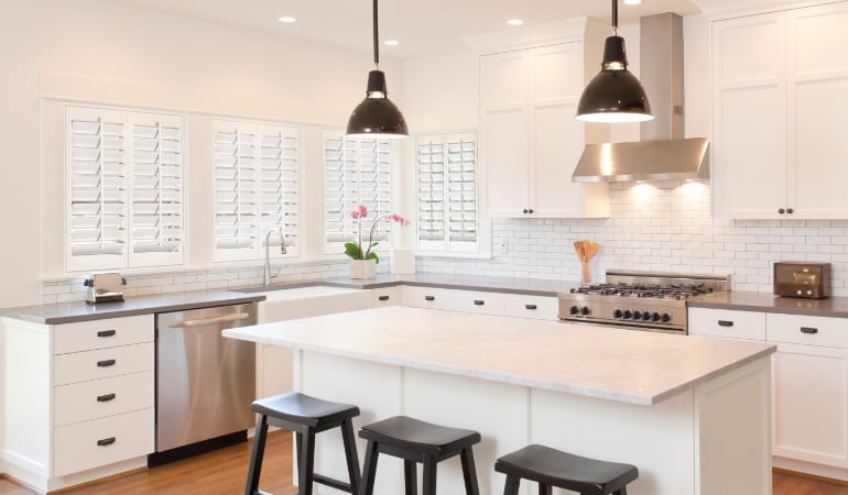 Plantation shutters in a bright Cleveland kitchen.